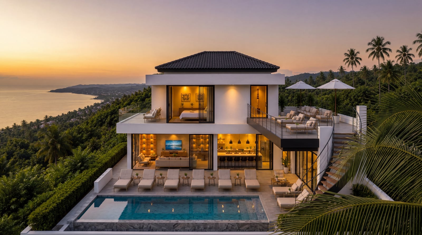 Azure 6 front aerial — villa, pool deck and hillside setting at dusk